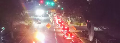 cars lined up to go through sobriety checkpoint